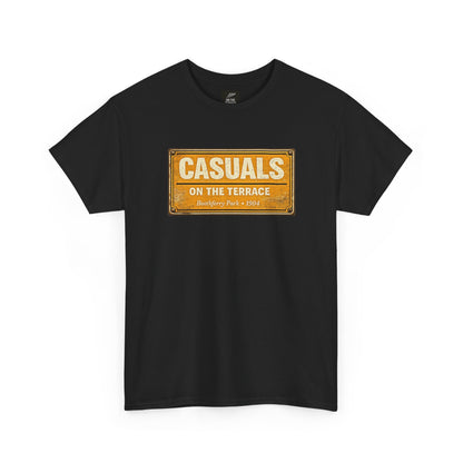 A black short-sleeve HULL CITY t-shirt with a vintage-style orange and yellow rectangular graphic on the chest that reads 'CASUALS ON THE TERRACE'