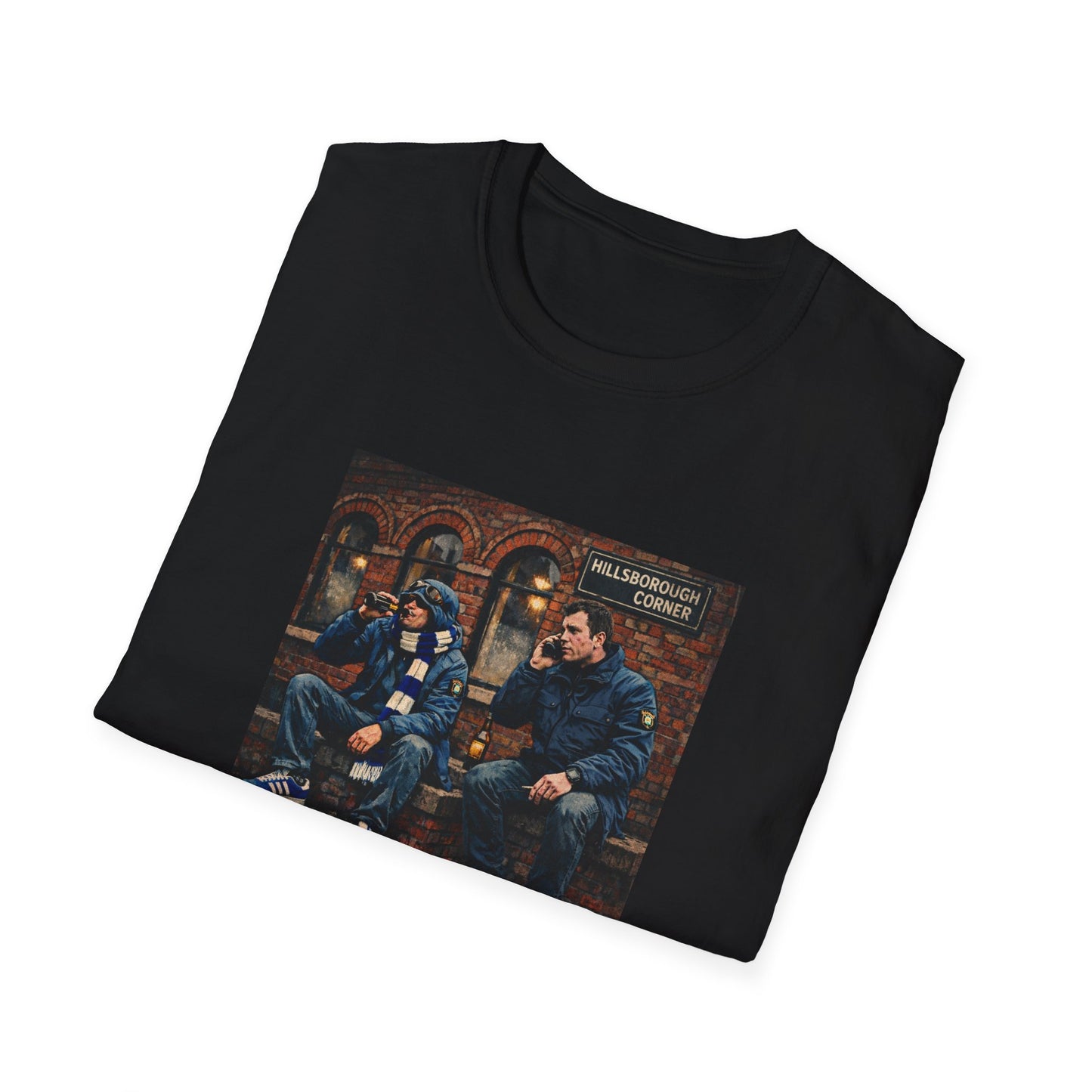 Folded black t-shirt with graphic design of two people sitting on a bench in a city street.