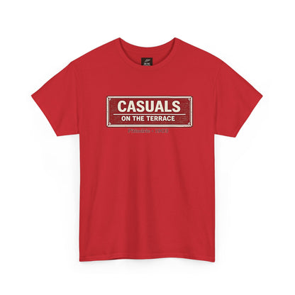 A red heavy cotton Aberdeen t-shirt flat lay featuring a central vintage red and white street sign graphic reading "CASUALS ON THE TERRACE" with "Pittodrie • 1903" printed below, and an inner neck label for On The Terrace., displayed on a clean white background.