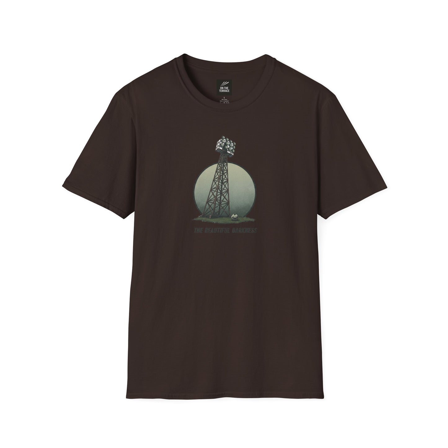 Dark brown t-shirt with a graphic of a stadium floodlight tower and soccer ball, text 'The Beautiful Darkness'