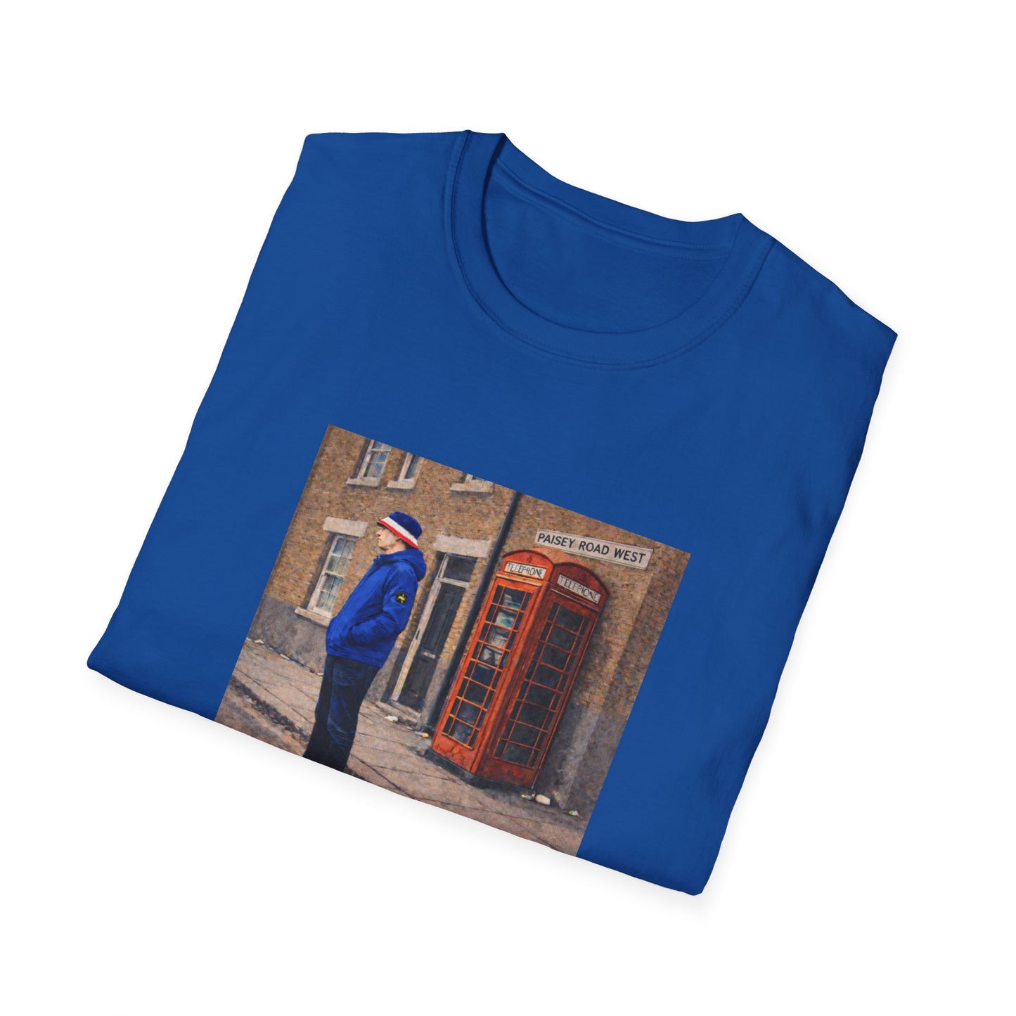 Folded blue t-shirt with a printed design of a man and red phone box on a white background