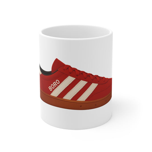 White ceramic mug with red Adidas Boro sneaker graphic featuring cream stripes and brown sole