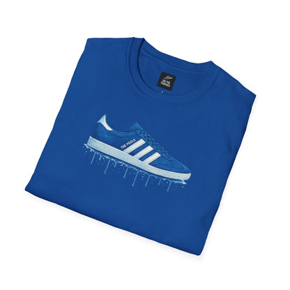 Blue folded t-shirt with a graphic of a blue sneaker and dripping paint design