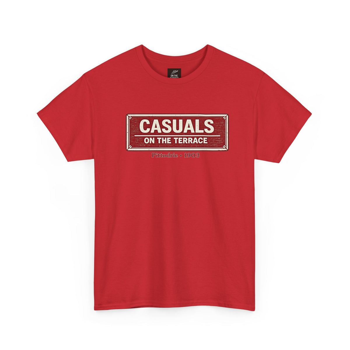 A red heavy cotton Aberdeen t-shirt flat lay featuring a central vintage red and white street sign graphic reading "CASUALS ON THE TERRACE" with "Pittodrie • 1903" printed below, and an inner neck label for On The Terrace., displayed on a clean white background.