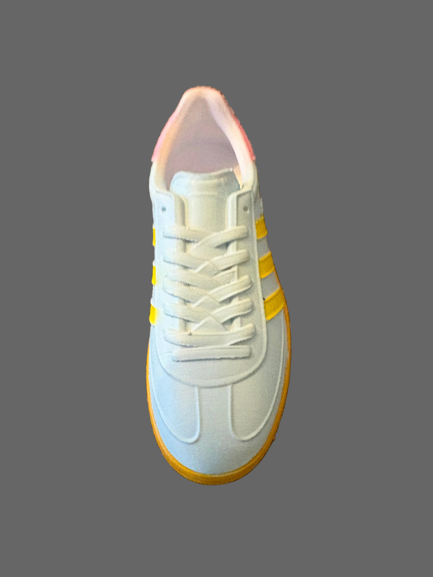 Light blue Adidas Havana 3d model sneaker with yellow accents on a textured brown surface