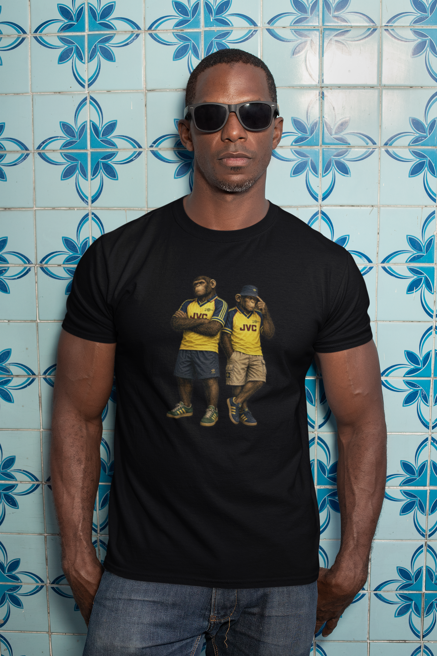 On The Terrace Northern Monkeys black graphic t-shirt featuring retro Arsenal yellow and navy inspired terrace casuals artwork.