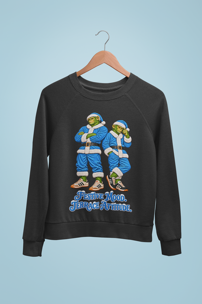 Sky blue Santa chimps Christmas sweatshirt on a hanger against a sky blue wall, Man City and Coventry colours
