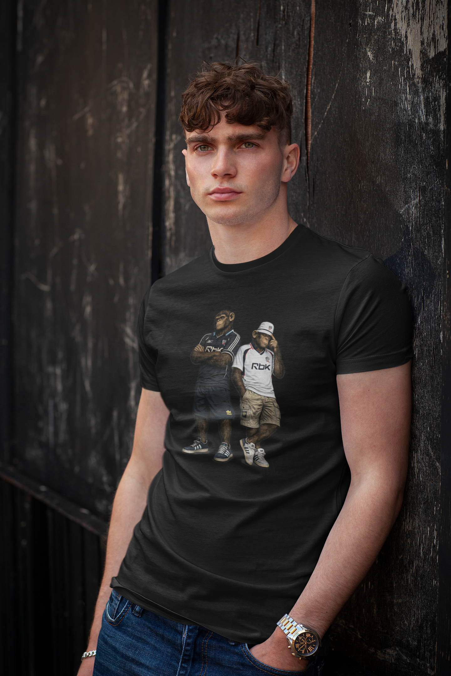 On The Terrace Northern Monkeys black graphic t-shirt featuring retro Bolton Wanderers inspired white and navy terrace casuals artwork.