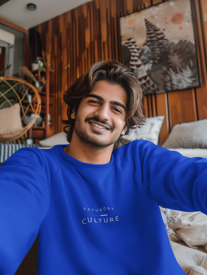 Man taking a selfie in the royal blue Saturday Culture embroidered sweatshirt