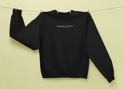 Black Terrace Casuals sweatshirt pegged on a washing line
