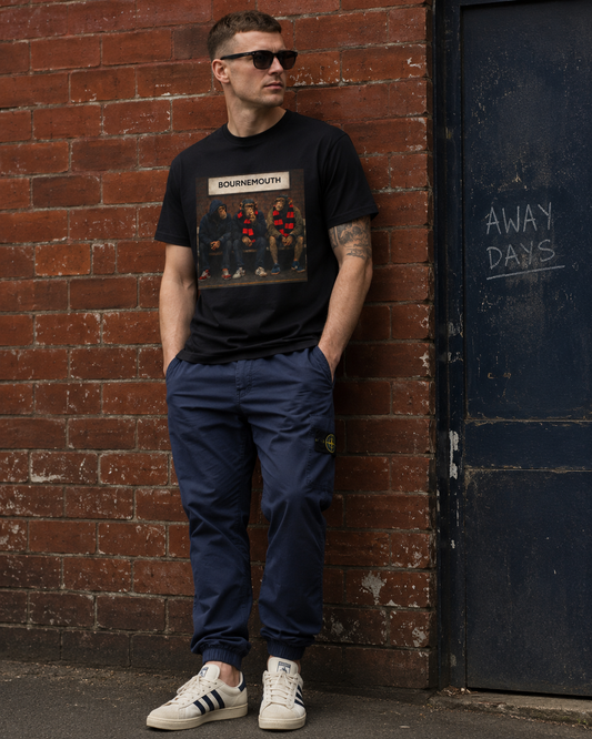 Man in a Bournemouth casuals graphic t-shirt, three chimps in red and black scarves on a bench, On The Terrace