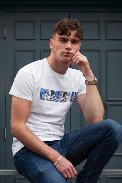 Man in the white Sheffield Wednesday tee with blue and black trainer print
