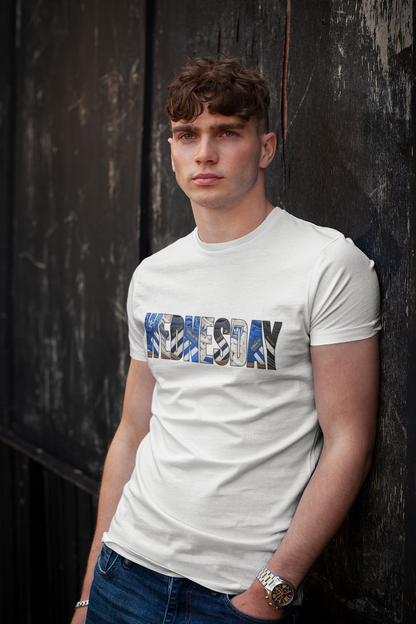Man by a wall in the white SWFC WEDNESDAY vintage trainers heavy cotton tee
