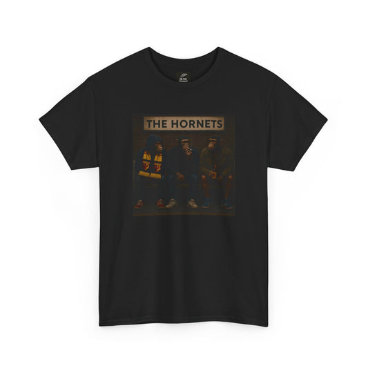 A black short-sleeve crewneck Watford t-shirt featuring a rectangular graphic print on the front with the text 'THE HORNETS' above a dark-toned illustration of three hornets.