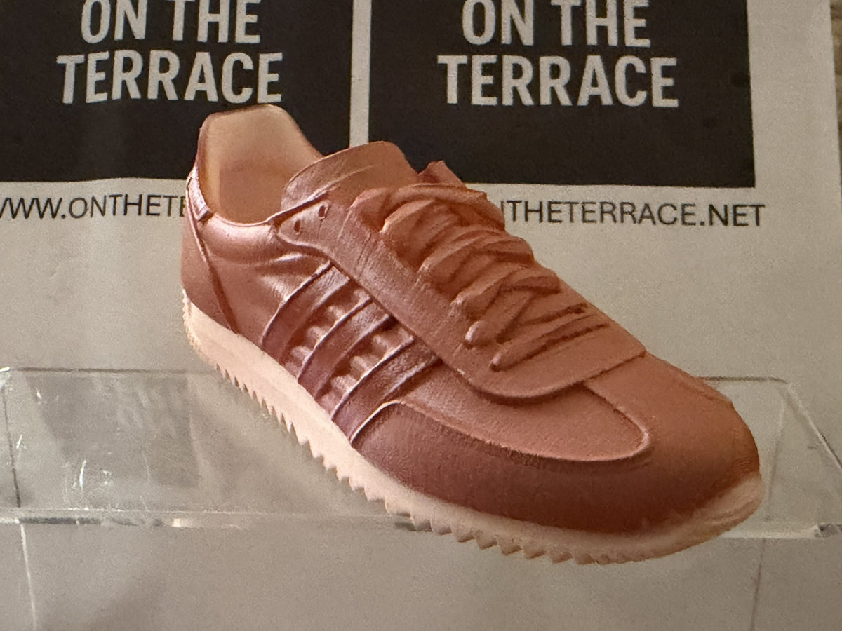 Angled view of painted copper Achille SPZL inspired 120 mm display model