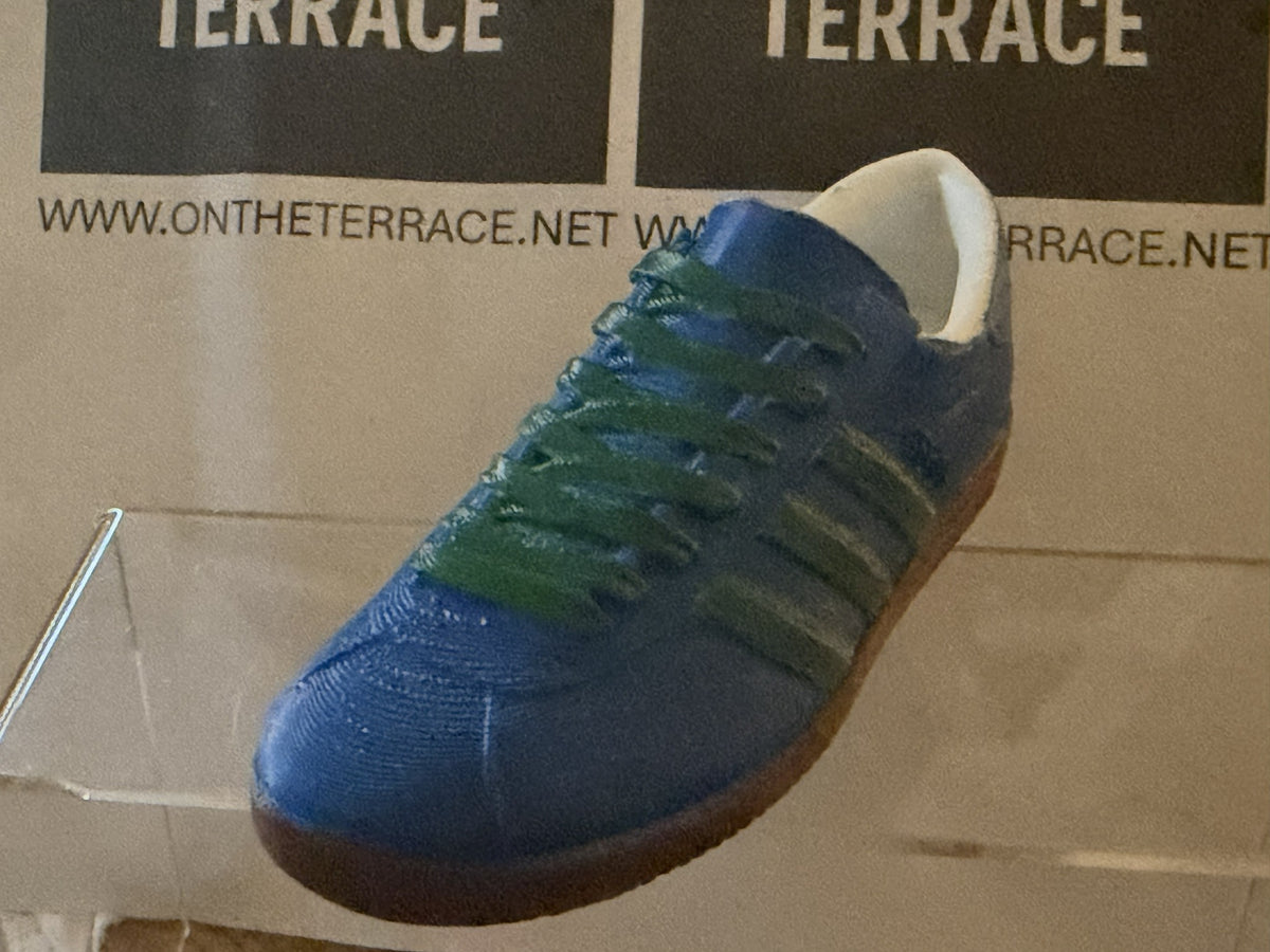 Angled view of blue and dark green Bern inspired 120 mm 3D model