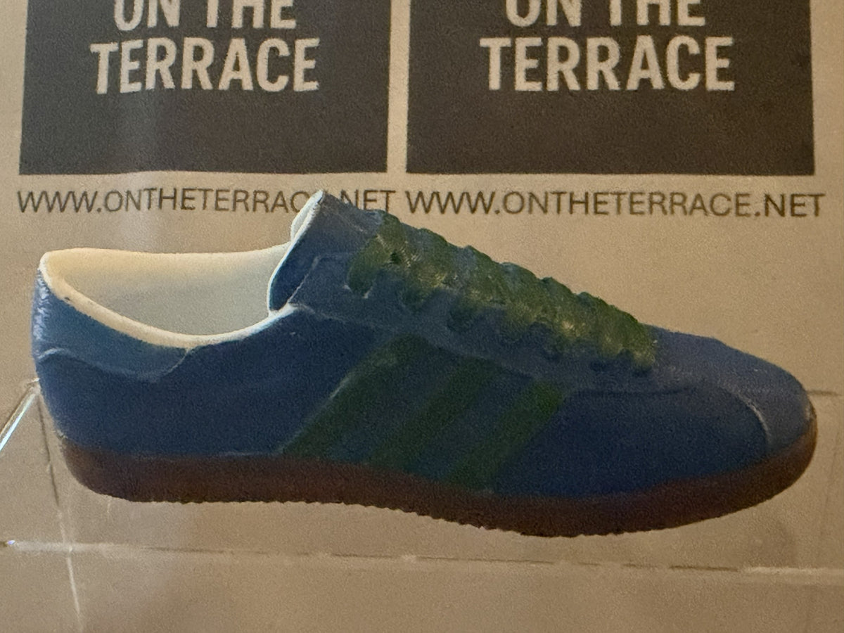 Opposite side of painted blue and green Bern inspired miniature trainer