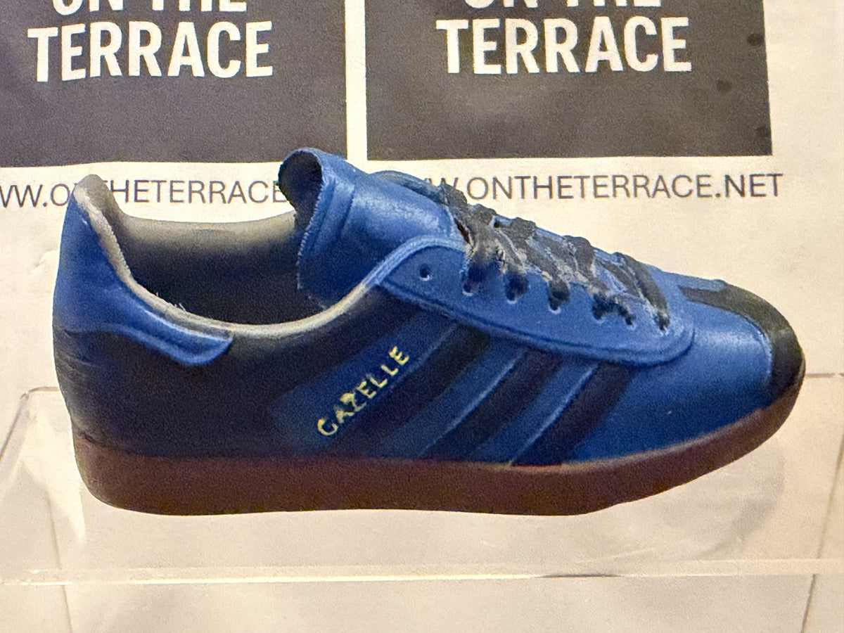 Painted 120 mm Gazelle inspired 3D trainer model with royal blue upper, black stripes and toe detail and dark gum sole, side view