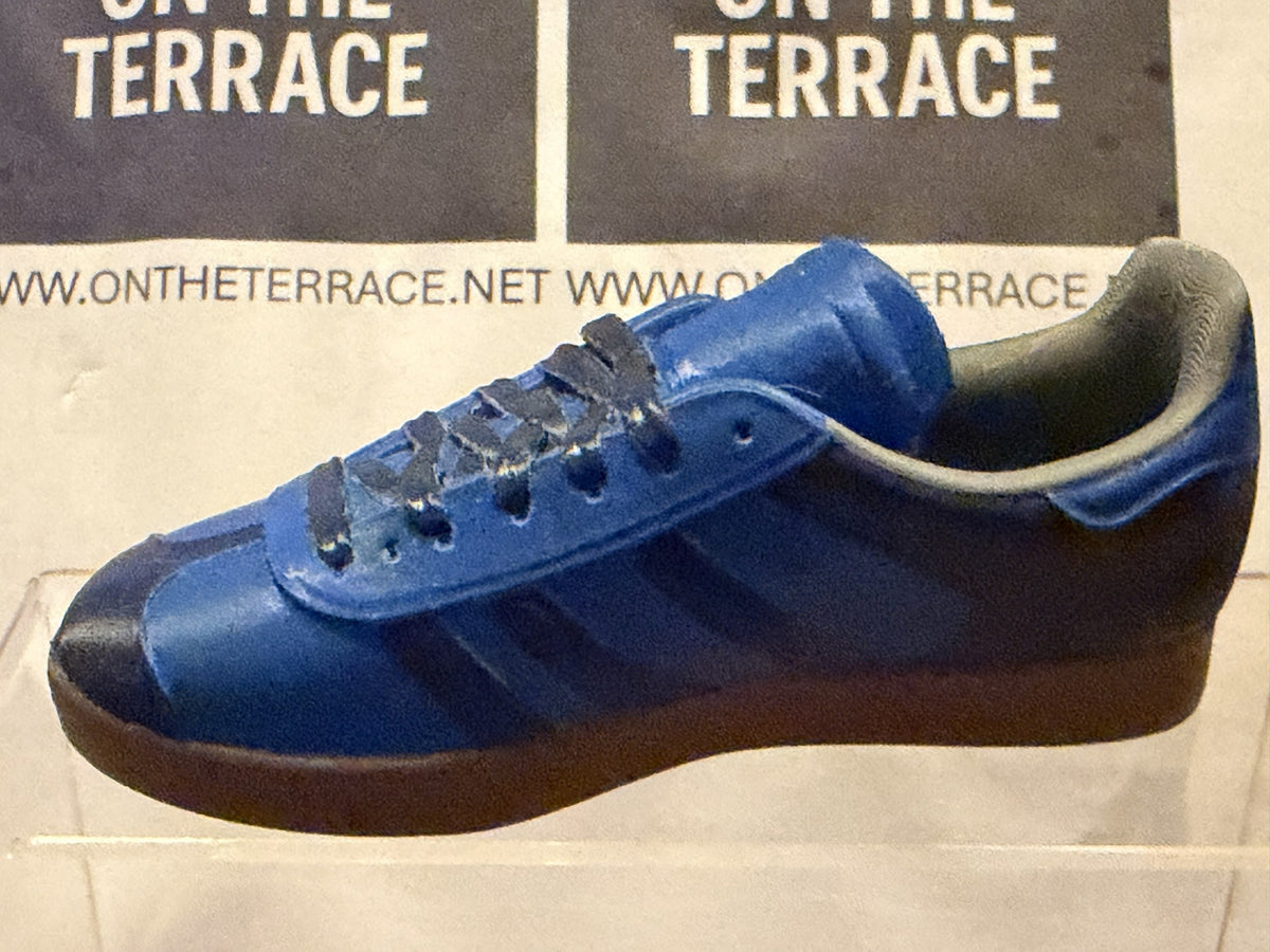 Opposite side of painted royal blue and black Gazelle inspired miniature trainer