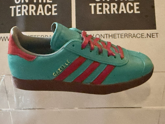 Painted 120 mm Gazelle inspired 3D trainer model with teal upper, red stripes and laces, and dark sole, side view