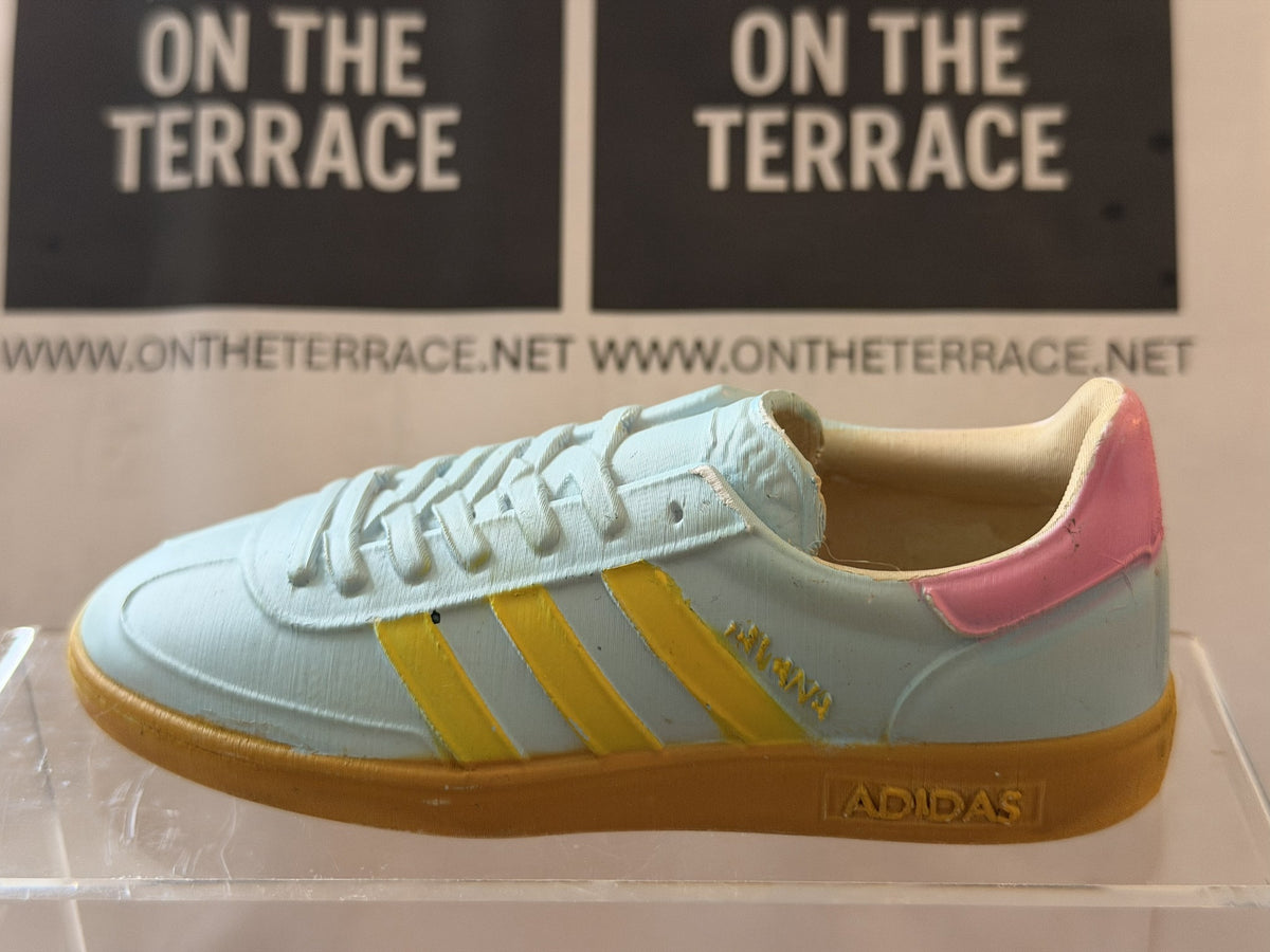 Painted 120 mm adidas Havana inspired model in pale blue with yellow stripes, pink heel and gum sole, side view