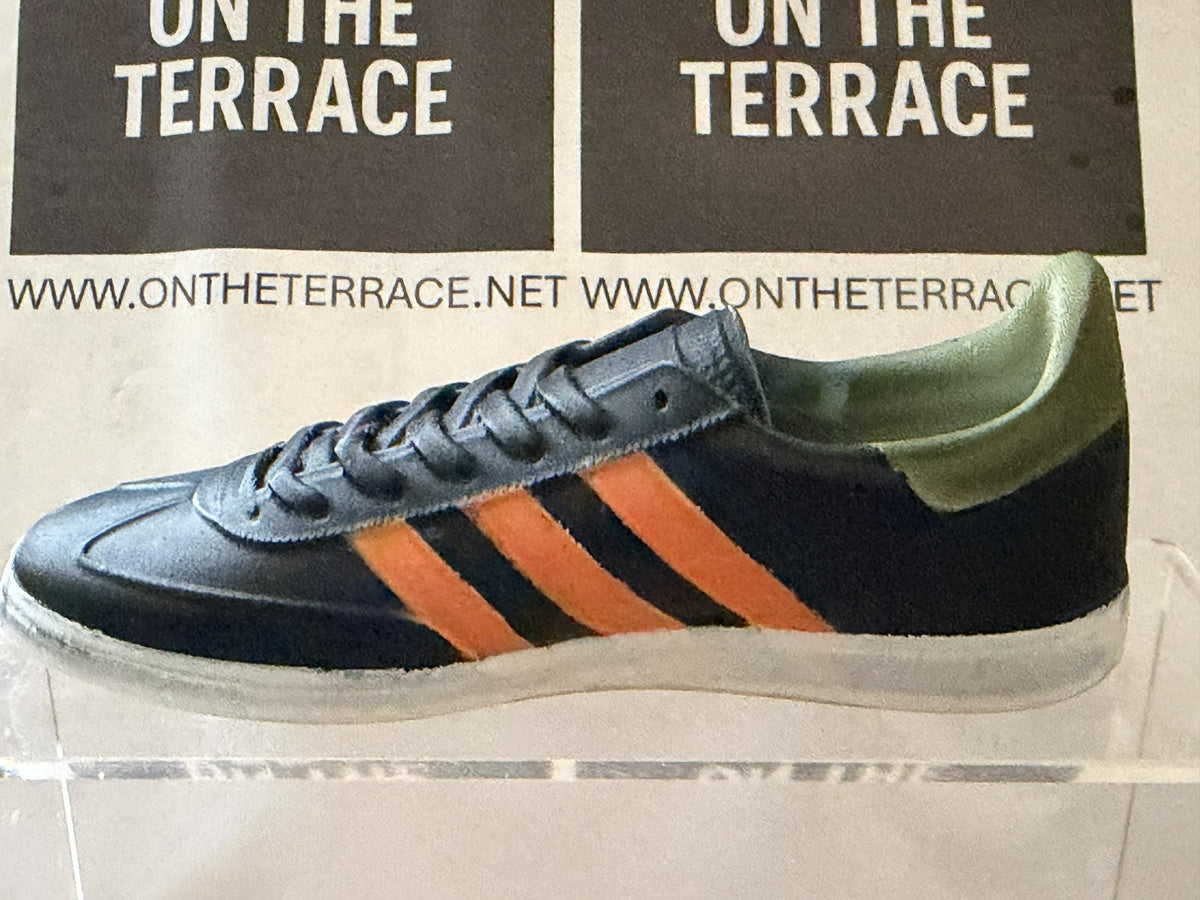 Opposite side of black and orange Spezial inspired 3D trainer model