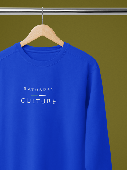 Royal blue Saturday Culture sweatshirt on a hanger, white embroidered SATURDAY CULTURE lettering