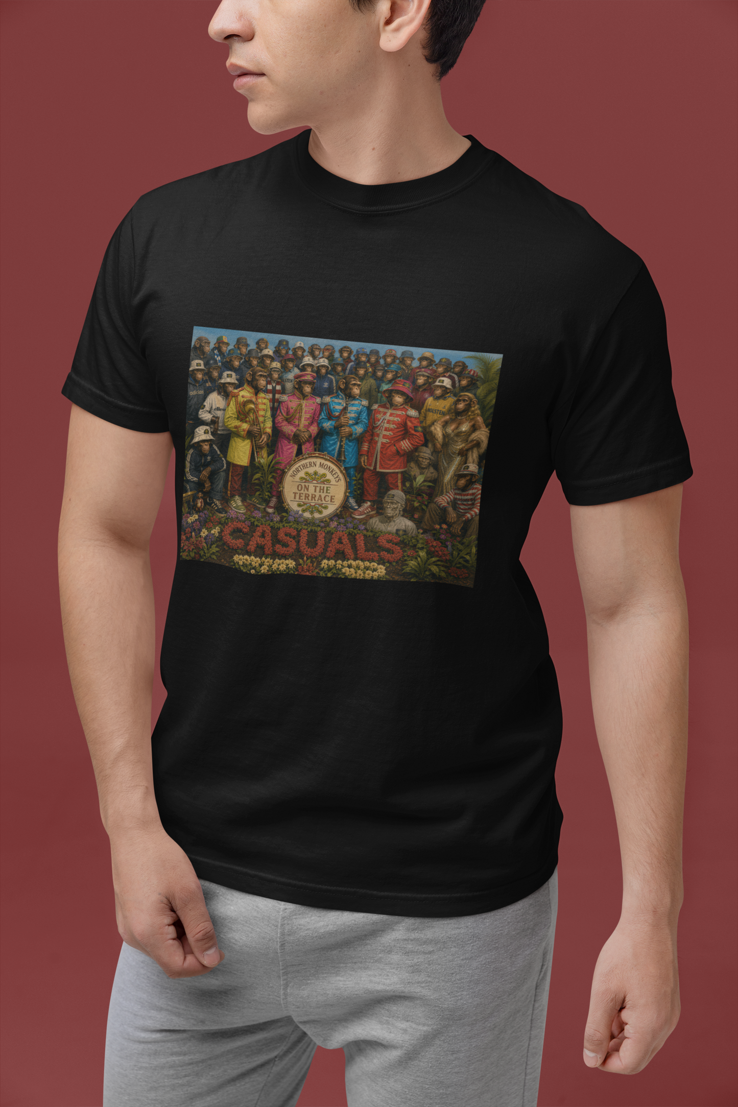 Man modelling black Beatles Sgt. Pepper Casuals T-shirt in studio
