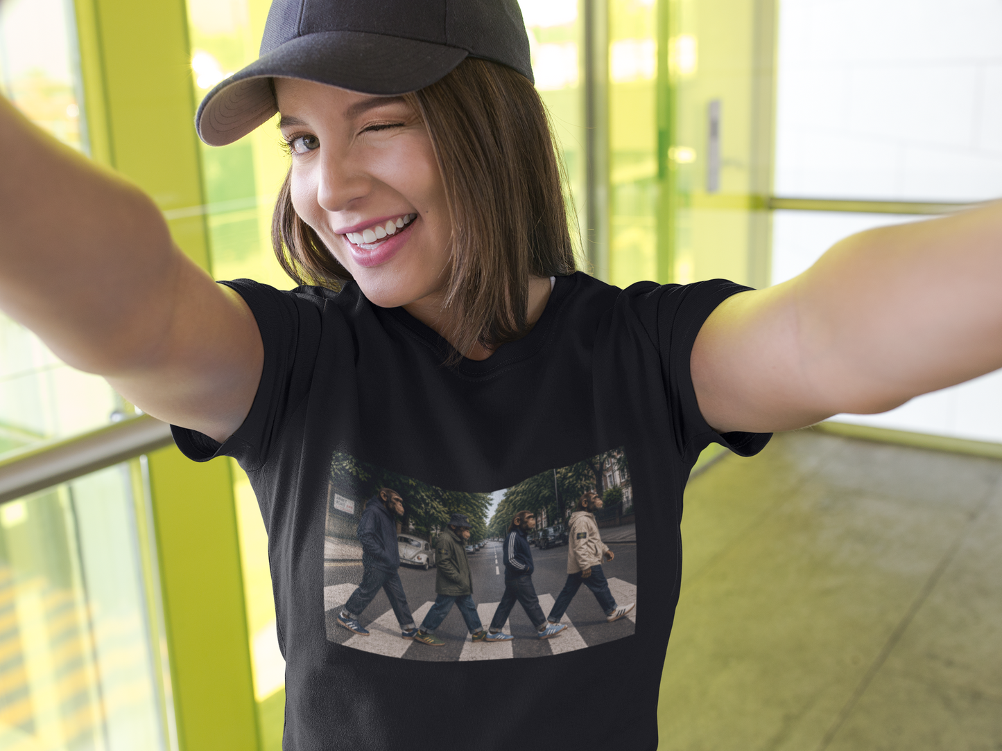 Woman wearing black Beatles Abbey Road Casuals T-shirt in lifestyle mockup