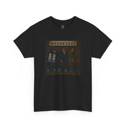 A black short-sleeve crewneck swfc t-shirt featuring a rectangular graphic print on the chest. The graphic shows three men sitting on a bench under a sign that reads 'WEDNESDAY', with a blue police box in the background.