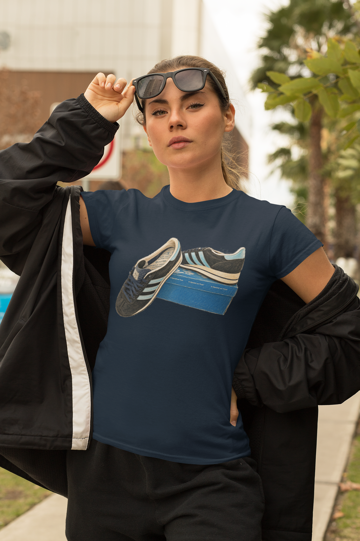 Navy blue retro sneaker graphic t-shirt with vintage trainer and shoebox print