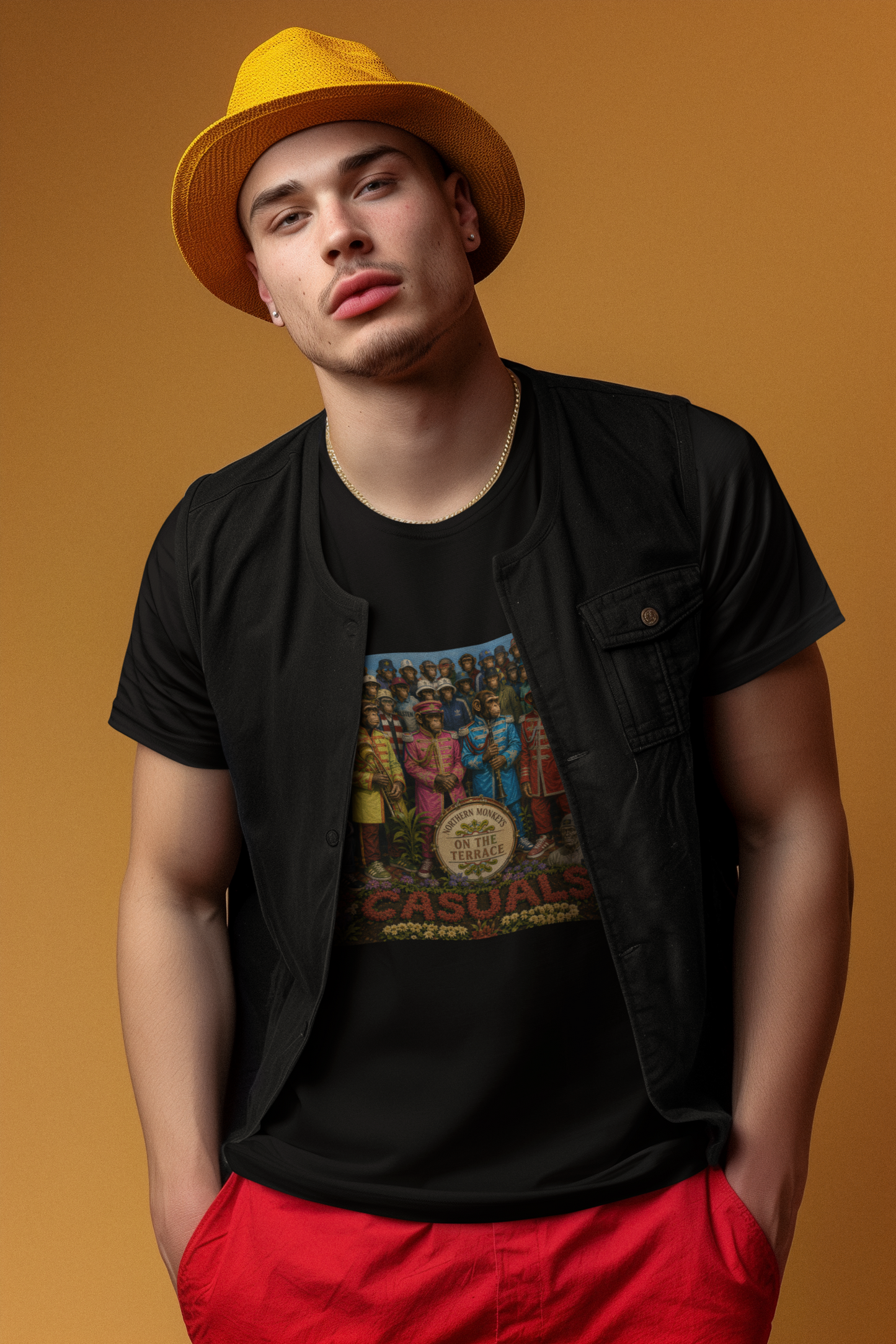 Man wearing black Beatles Sgt. Pepper Casuals T-shirt in casual outfit